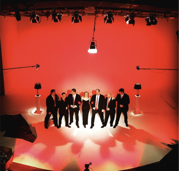 Image of a group using Studio A's large cyc wall in Nashville film studio NuMynd Studios